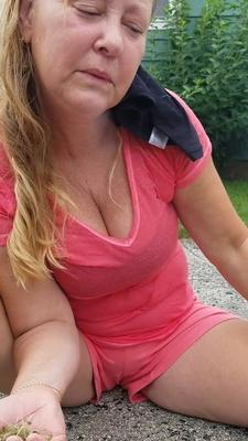 Cute older blonde Lori flashing her nice tight pussy outside.