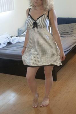 Petite and curvy blonde in glasses undresses